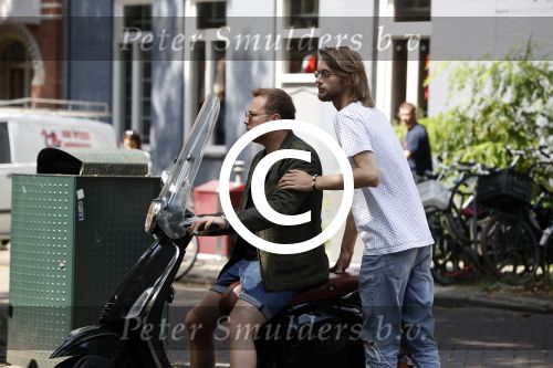 Amsterdam 21 juli 2017
Jamai Loman met zijn vriend Michael Muller op hun vespa scooter