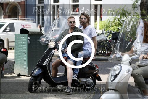 Amsterdam 21 juli 2017
Jamai Loman met zijn vriend Michael Muller op hun vespa scooter