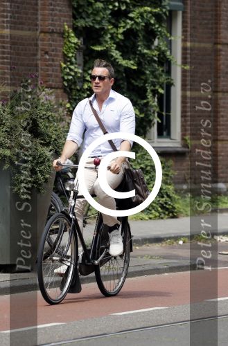 Amsterdam 5 juli 2017
Henry van Loon op terrasPaul Groot op de fiets in Amsterdam
