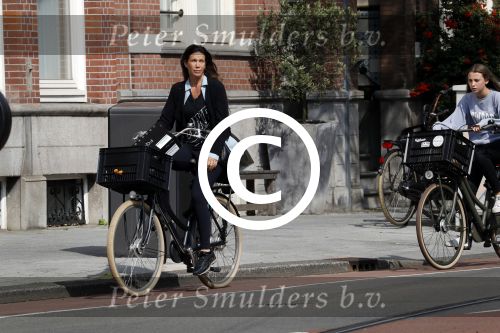 Amsterdam 7 september 2017 
Robine v d Meer met dochter op de fiets in amsterdam