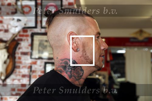 Eindhoven 28 augustus 2018
Rolf Tangel laat bij Dannyâ€™s tattooshop in Eindhoven zijn Barbie Samantha tatoos weghalen.