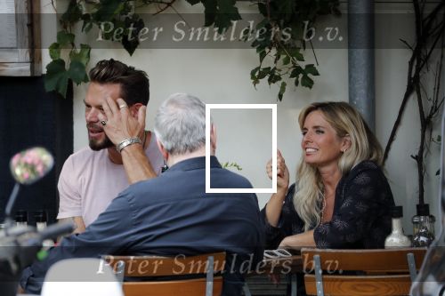 Amsterdam 28 augustus 2019
Candy Dulfer met vriend Rafael op terras en daarna op de fiets in Amsterdam.