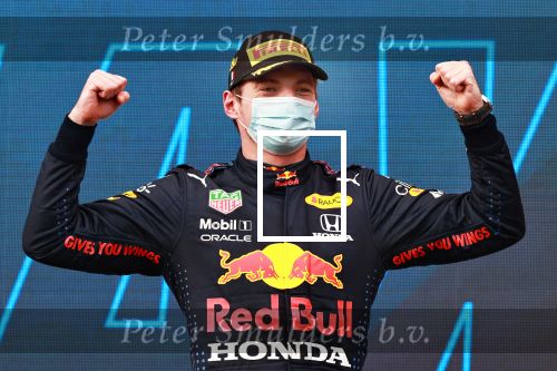 IMOLA, ITALY - APRIL 18: Race winner Max Verstappen of Netherlands and Red Bull Racing celebrates on the podium during the F1 Grand Prix of Emilia Romagna at Autodromo Enzo e Dino Ferrari on April 18, 2021 in Imola, Italy. (Photo by Mark Thompson/Getty Images)