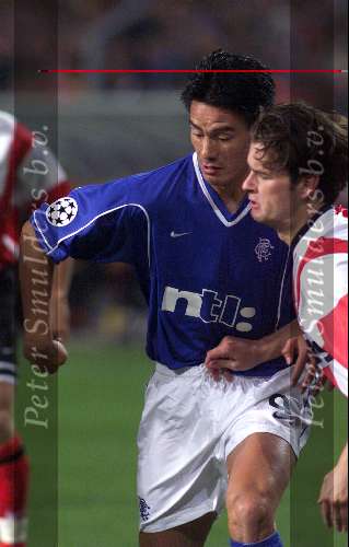 Eindhoven, 28 September 1999
Wedstrijd uit de voorronde van de CHAMPIONS-League tussen PSV & Glasgow Rangers, eindstand 0-1
ROB WIELAERT in duel met Michael Mols