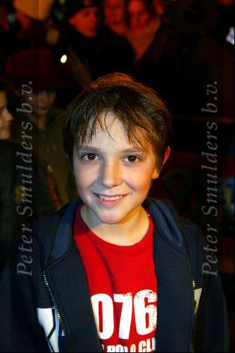 Amsterdam 9 december 2003
Premiere Pietje Bell in City theater.
Quinten Schram met zijn moeder Maria Peters en zijn vader Dave Schram.