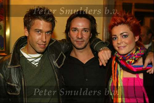 Amsterdam 2 december 2003
Premiere West Side Story in Carre.  Spiros met Kim Lian v d Meij en vriend