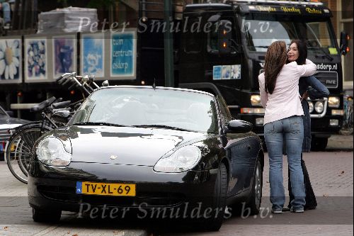 Amsterdam 17 september 2004
Carmen Rijkaard met porsche 911 cabrio op de Cornelis Schuytstraat