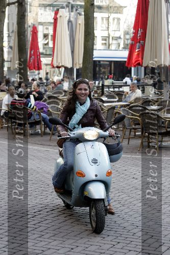 Amsterdam 23 maart 2005
Josefine v Asdonk op  Vespa scooter in Amsterdam
Peter Smulders bv