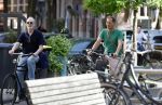 Amsterdam 29 mei 2026
Joep Onderdelinden met partner Hans op de fiets in Amsterdam zuid .