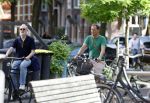 Amsterdam 29 mei 2026
Joep Onderdelinden met partner Hans op de fiets in Amsterdam zuid .
