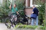 Amsterdam 29 mei 2026
Joep Onderdelinden met partner Hans op de fiets in Amsterdam zuid .