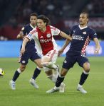 Amsterdam, 2 Mei 2026
Kompetitiewedstrijd AJAX-PSV, eindstand 2-2
Ko Itakura met Kiliann Sildillia
