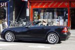 Amsterdam 27 maart 2007
Maik de Boer in zijn mercdedes Cabrio. steekt tong uit