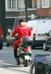 Amsterdam 2 april 2007
Regilo Tuur op zijn vespa scooter.
