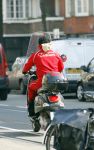 Amsterdam 2 april 2007
Regilo Tuur op zijn vespa scooter.