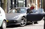 Amsterdam 7 april 2011
Candy Dulfer met gsm en Porsche Cayman op de cornelis schuytstraat.
Peter Smulders bv