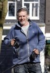 Amsterdam 2 april 2013
Hans v d Togt aan het wandelen met zijn hond en twee andere honden.
Peter Smulders bv