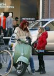 Amsterdam 11 maart 2015    
Isa Hoes met dochter Vlinder op de scooter