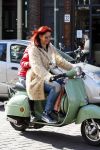 Amsterdam 11 maart 2015    
Isa Hoes met dochter Vlinder op de scooter