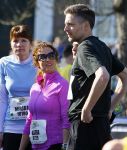 Den Haag 8 maart 2015Katja Schuurman loopt de city pier city loop CPC van 10 km voor haar tv programma. Marco Koers vergezelt haar.