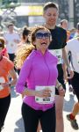 Den Haag 8 maart 2015Katja Schuurman loopt de city pier city loop CPC van 10 km voor haar tv programma. Marco Koers vergezelt haar.