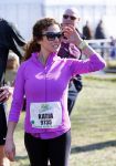 Den Haag 8 maart 2015Katja Schuurman loopt de city pier city loop CPC van 10 km voor haar tv programma. Marco Koers vergezelt haar.