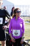 Den Haag 8 maart 2015Katja Schuurman loopt de city pier city loop CPC van 10 km voor haar tv programma. Marco Koers vergezelt haar.