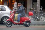 Amsterdam 9 maart 2015 
Martijn Krabbe doet boodschappen op zijn vespa scooter.