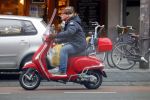 Amsterdam 9 maart 2015 
Martijn Krabbe doet boodschappen op zijn vespa scooter.