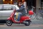 Amsterdam 9 maart 2015 
Martijn Krabbe doet boodschappen op zijn vespa scooter.