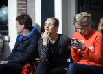 Amsterdam 10 maart 2015  
Tess Milne en Kimberly Klaver samen op een terrasje en Tess daarna met koptelefoon op de fiets