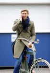Amsterdam 20 maart 2016 
Evgeniy Levchenko bellend op zijn fiets in amsterdam zuid.