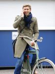 Amsterdam 20 maart 2016 
Evgeniy Levchenko bellend op zijn fiets in amsterdam zuid.