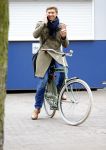 Amsterdam 20 maart 2016 
Evgeniy Levchenko bellend op zijn fiets in amsterdam zuid.