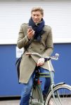 Amsterdam 20 maart 2016 
Evgeniy Levchenko bellend op zijn fiets in amsterdam zuid.