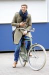 Amsterdam 20 maart 2016 
Evgeniy Levchenko bellend op zijn fiets in amsterdam zuid.
