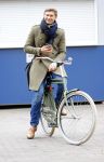 Amsterdam 20 maart 2016 
Evgeniy Levchenko bellend op zijn fiets in amsterdam zuid.