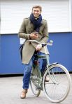 Amsterdam 20 maart 2016 
Evgeniy Levchenko bellend op zijn fiets in amsterdam zuid.