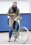 Amsterdam 20 maart 2016 
Evgeniy Levchenko bellend op zijn fiets in amsterdam zuid.