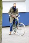 Amsterdam 20 maart 2016 
Evgeniy Levchenko bellend op zijn fiets in amsterdam zuid.