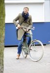 Amsterdam 20 maart 2016 
Evgeniy Levchenko bellend op zijn fiets in amsterdam zuid.