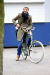 Amsterdam 20 maart 2016 
Evgeniy Levchenko bellend op zijn fiets in amsterdam zuid.