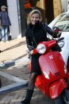 Amsterdam 14 maart 2016 
Gigi Ravelli op haar scooter op de pc hooftstraat