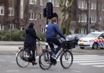 Amsterdam 23 maart 2016 
Gijs Staverman met (een) vriendin op de fiets in Amsterdam.