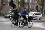 Amsterdam 23 maart 2016 
Gijs Staverman met (een) vriendin op de fiets in Amsterdam.
