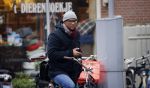 Amsterdam 11 maart 2016
Jimmy Geduld bellend op straat.