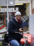 Amsterdam 11 maart 2016
Jimmy Geduld bellend op straat.