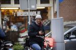 Amsterdam 11 maart 2016
Jimmy Geduld bellend op straat.