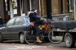 Amsterdam 1 maart 2017 
Caro Emerald op haar fiets bij haar huis