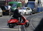 Amsterdam 9 maart 2017 
Ruben Nicolai op zijn scooter